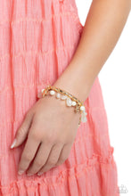 Load image into Gallery viewer, Surfer Shanty - Gold Paparazzi Accessories - VJ Bedazzled Jewelry